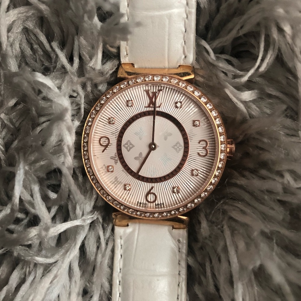 Tambour Monogram Louis Vuitton watch.